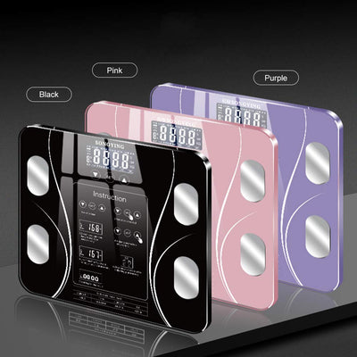 BodyIQ™ smart scale colors, black, pink and purple, with four electrodes and digital display. 