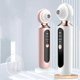 ClearView™ pore vacuum device in white and pink. handheld ultrasonic blackhead remover with built-in magnifying lens.
