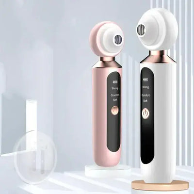 ClearView™ pore vacuum device in white and pink. handheld ultrasonic blackhead remover with built-in magnifying lens.